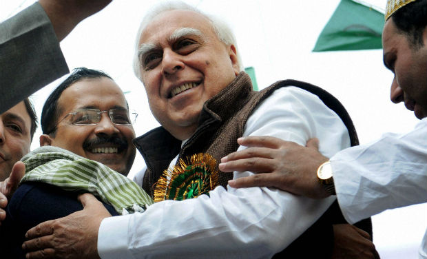 Union Minister Kapil Sibal and Delhi Chief Minister Arvind Kejriwal hug each other during an Eid Milad-un-Nabi procession in New Delhi on Tuesday - PTI Union Minister Kapil Sibal and Delhi Chief Minister Arvind Kejriwal hug each other during an Eid Milad-un-Nabi procession in New Delhi on Tuesday - PTI